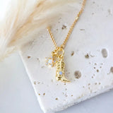 Opal Boot and Star Necklace